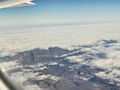 Cape Town mountains from above their clouds (SMH, August 2024); the layer is rather thin and attached to the mountains.